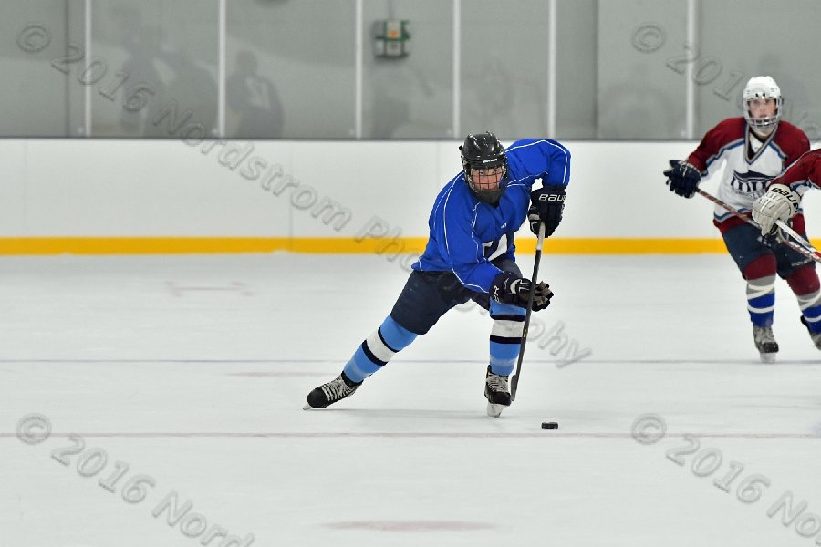 Wheaton College Men\'s Ice Hockey vs Middlesex Community College. - Photo By: KEITH NORDSTROM